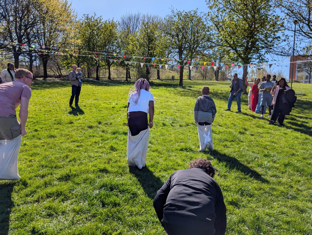 Children taking part in an outdoor egg hunt.